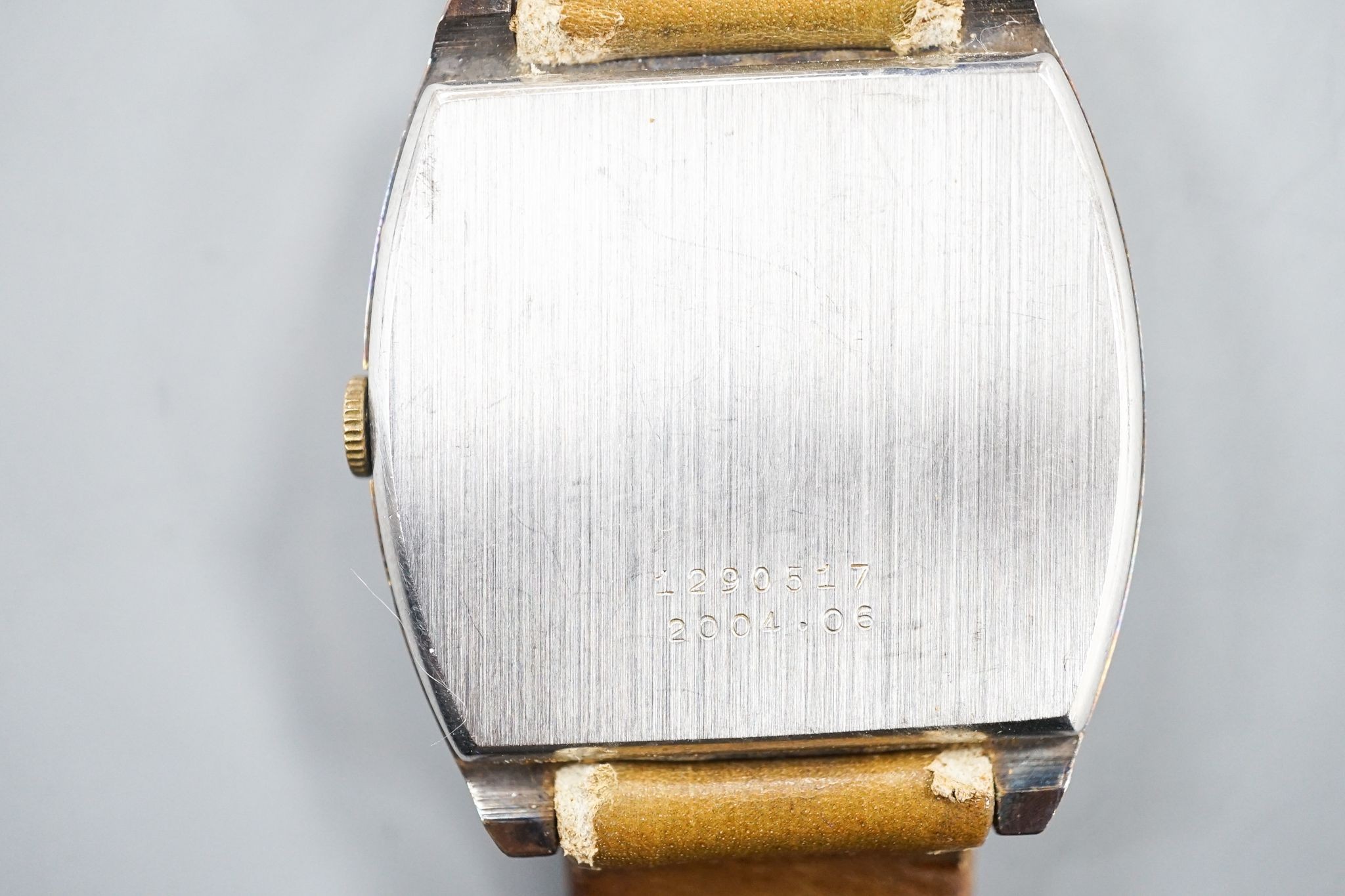 A gentleman's stainless steel Jaeger LeCoultre Club manual wind wrist watch, on associated strap, case diameter 32mm.